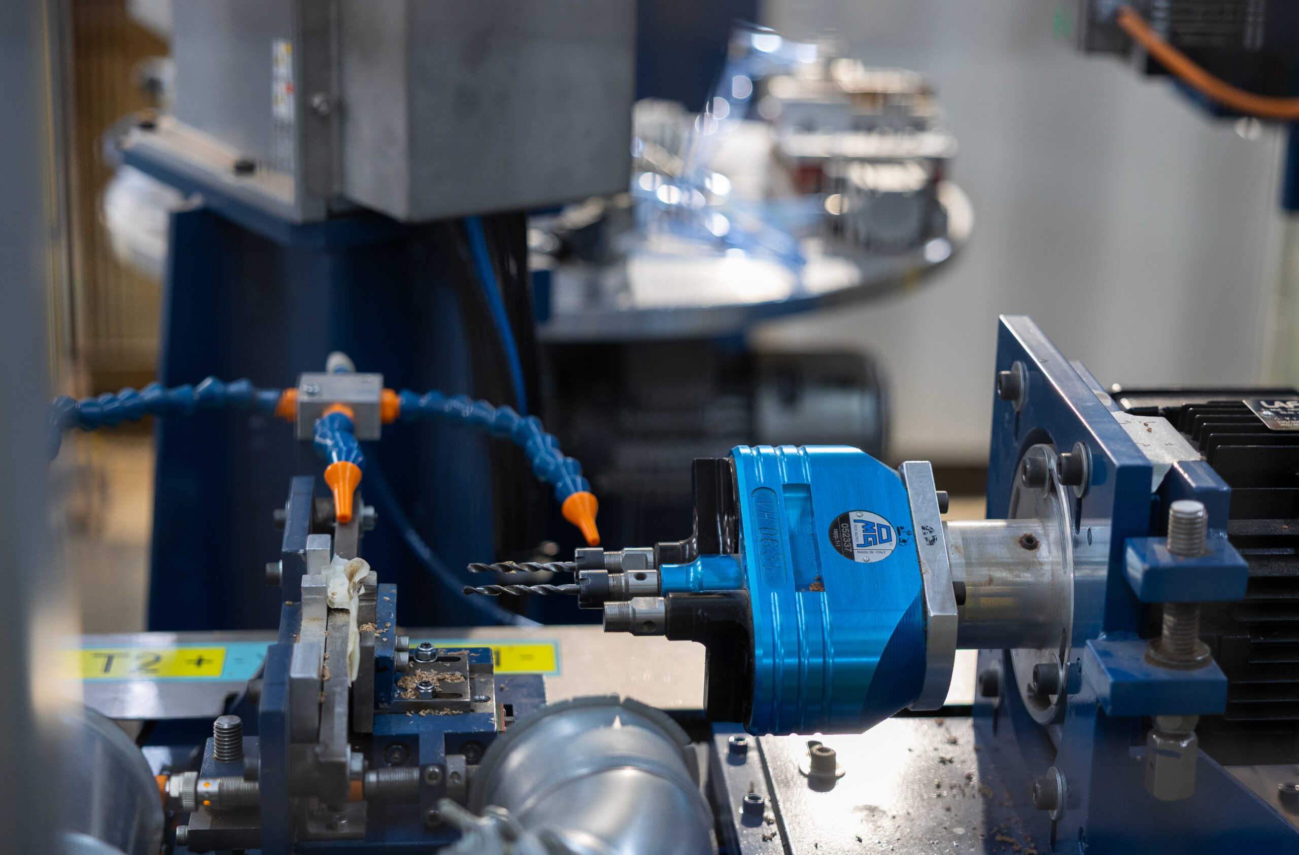 Wood drilling machine in the factory workshop