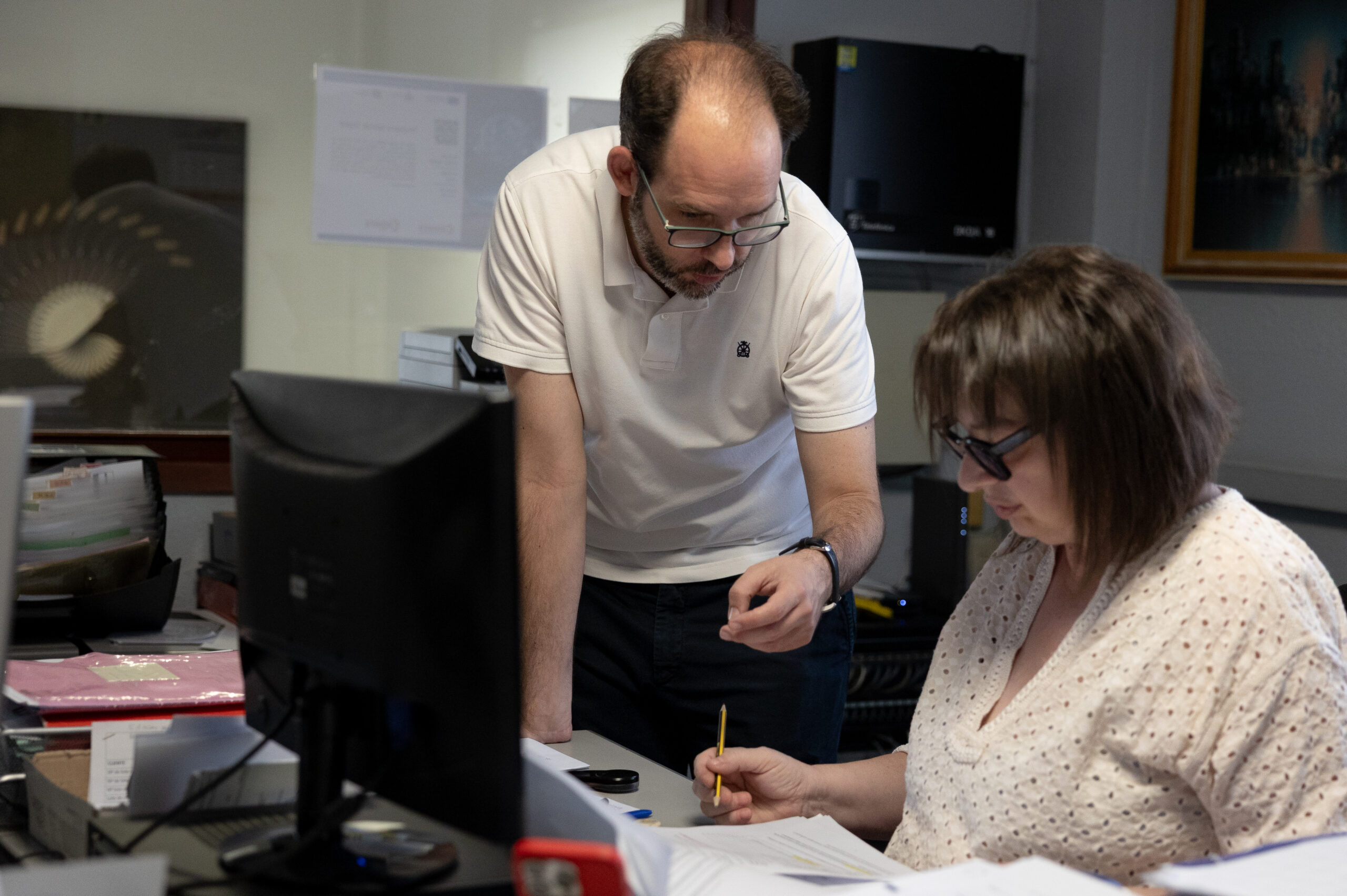 People working at the Nunez Handles office